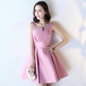 The Dress Rail Pink Champagne Shiny Asymmetrical Dress